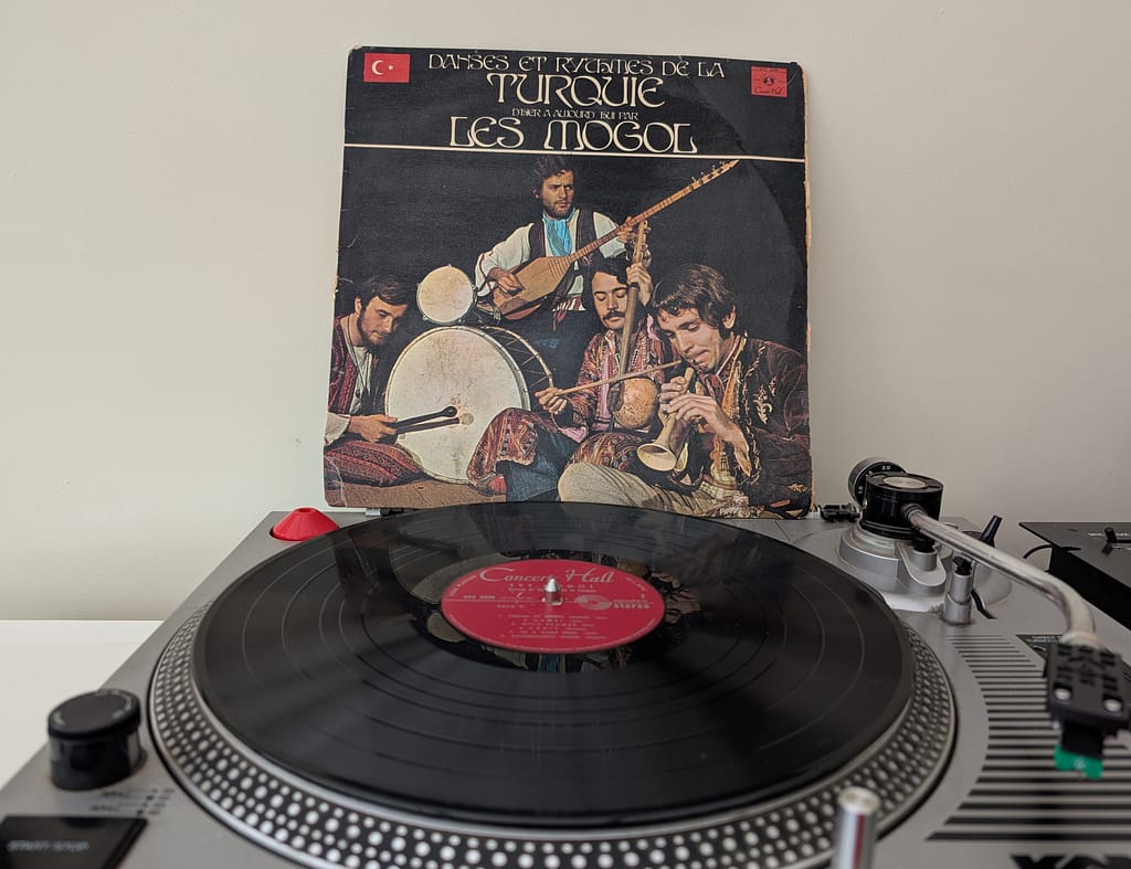 Original Les Mogol Turkish psychedelic LP on a turntable after being purchased at Sonic Import in Nice, France.